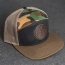 Leather Patch Flat Bill 7 Panel Trucker Hat - Ox & Pine Logo Stamp - Circle