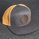 Your Logo on a Leather Patch Flat Bill 7 Panel Trucker Hat - Circle Patch