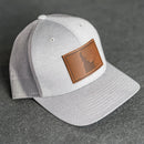 Leather Patch Performance Style Trucker Hat - Idaho Stamp