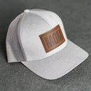 Leather Patch Performance Style Trucker Hat - Mom Stamp - Block Font