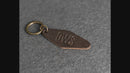 Leather Motel Key Shape Keychain with a Drive Safe Stamp Design