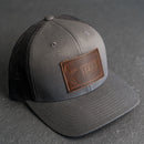 Leather Patch Trucker Style Hat - Texas License Plate Stamp